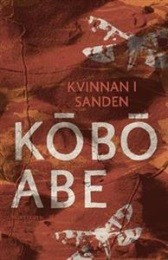 Bild på bokomslag för Kvinnan i sanden